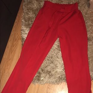 Red dress pants with tie and paper bag waist
